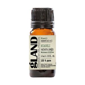 Amber şişede 10 ml saf niaouli uçucu yağı, krem etiketli.